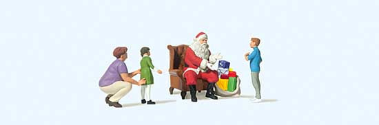 Preiser 10763 - Weihnachtsmann im Sessel mit Mutter und Kind