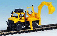 Kibri 16307 - UNIMOG Zweiwege Fahrzeug mit Heckbagger