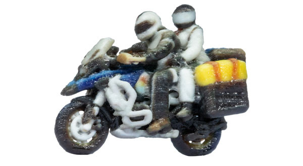 Noch 10900- ourenmotorrad mit Sozia, fahrend